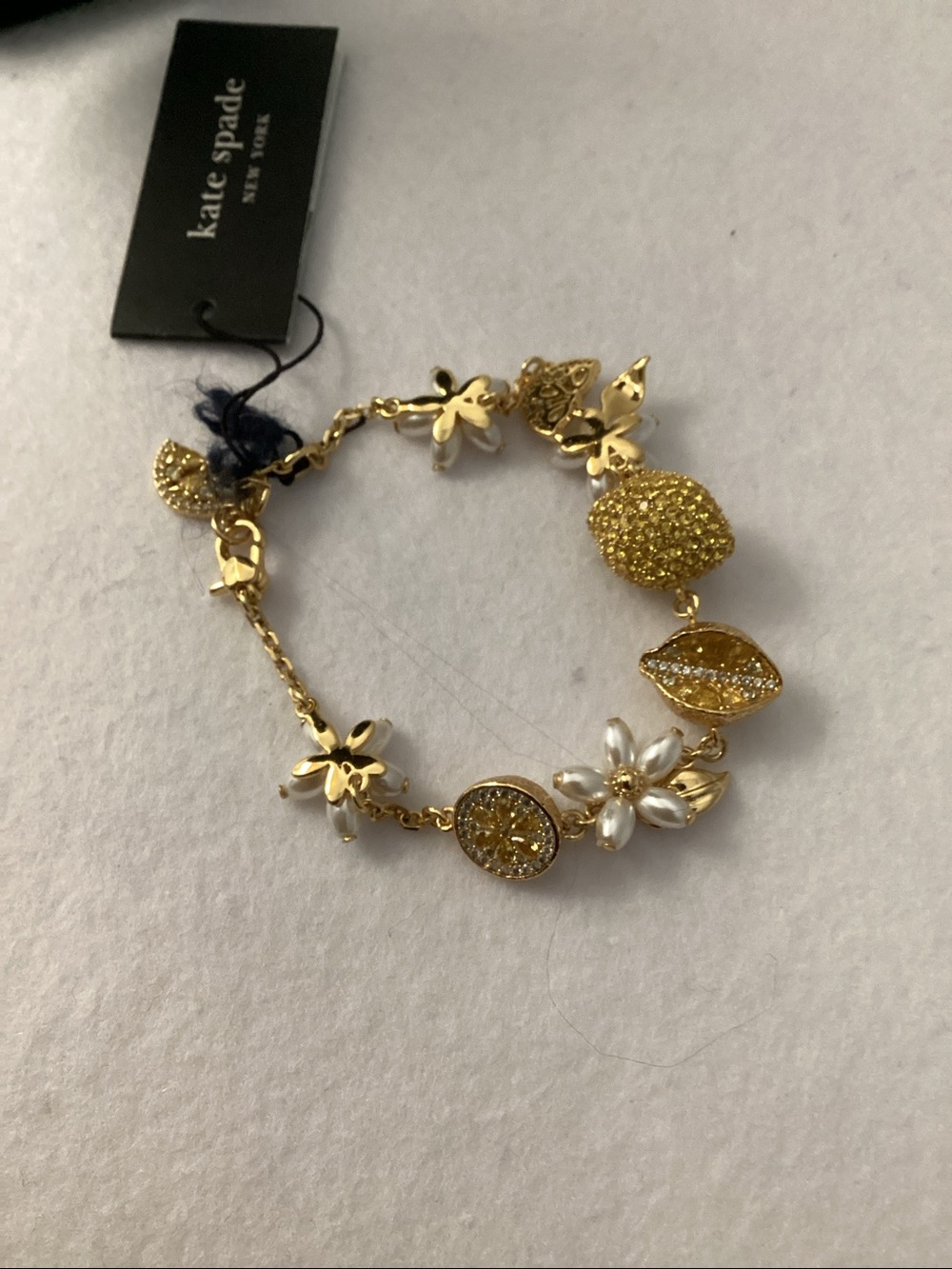 Kate Spade Gold-Tone Flower & Lemon Multi-Charm Pendant Bracelet - Picture 2 of 7